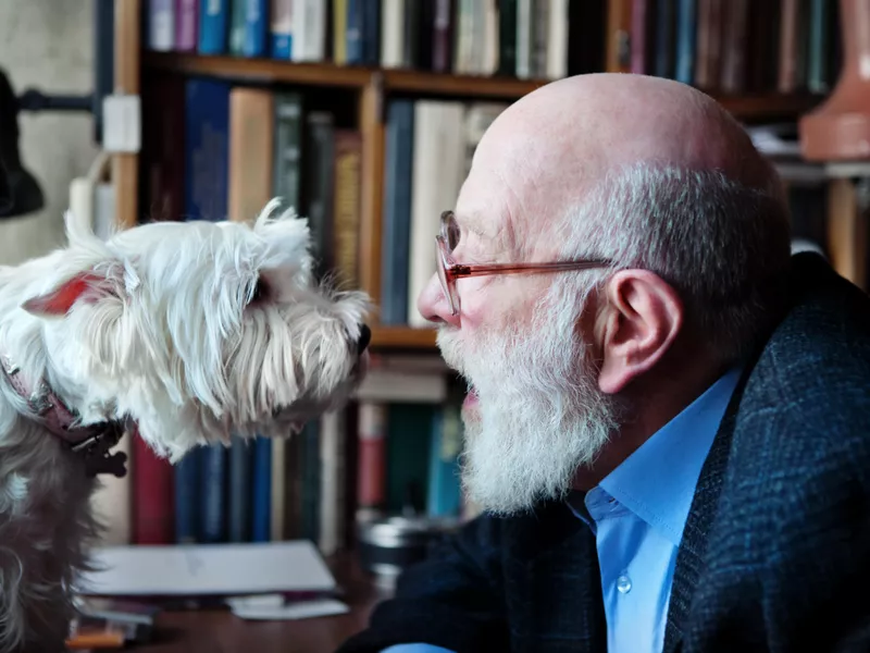 Senior Adult Man With His Dog