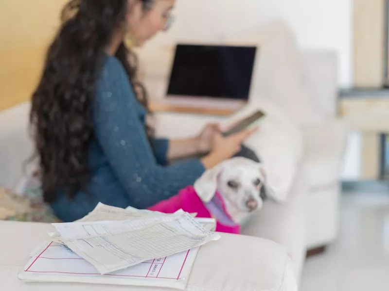 Woman sitting with dog