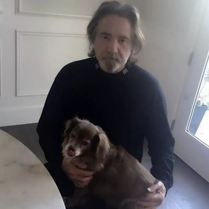Geezer Butler with dog