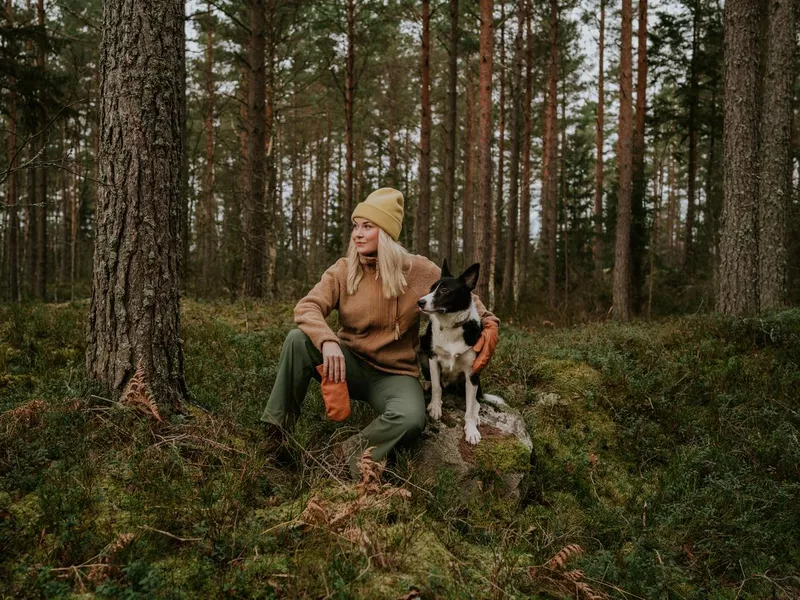 Woman and her dog out on hike